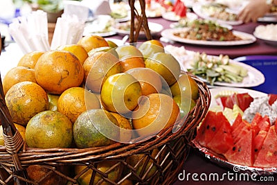 Orange in basket and multi fruit. Stock Photo
