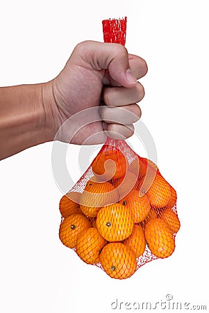 Orange being held Stock Photo