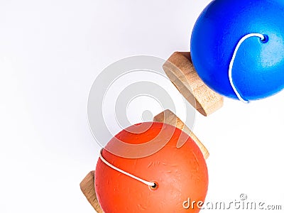 Orange and blue colorful Kendama japanese toys, isolated on white, competition concept Stock Photo