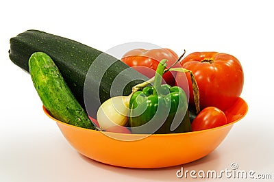 Orange Bowl of Garden Fresh Vegetables on White Background Stock Photo