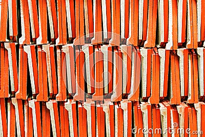 Orange brick stack in construction site, Texture Background Stock Photo