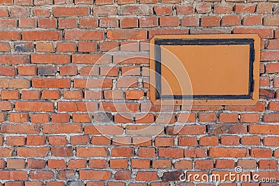 Orange brick wall background whit small door Stock Photo