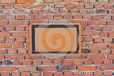 Orange brick wall background whit small door Stock Photo