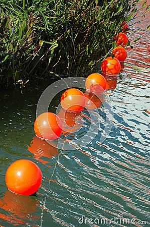 Orange buoys Stock Photo