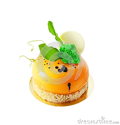 Orange carrot cake dessert with green leaves and white chocolate Stock Photo