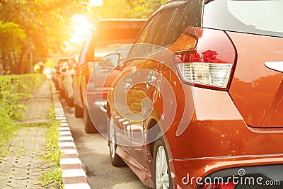 Car parked neatly inside an outdoor parking lot Stock Photo