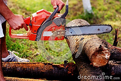 ORANGE CHAINSAW Stock Photo