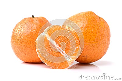 An orange citrus fruit unpeeled, peeled, halved and sliced Stock Photo