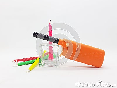 Orange Color Automatic Lighter for Kitchen Utensils and Birthday Candles in White Background 17 Stock Photo