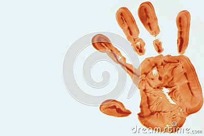 Orange color handprint on a white background Stock Photo