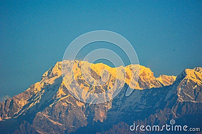 Orange color of sunrise on top of the mountain Stock Photo