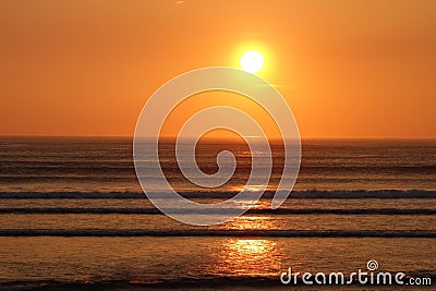 Orange colored sunset at the sea . sligo strandhill ocean links connacht . Stock Photo