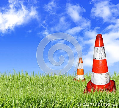 Orange cone on the lawn Stock Photo