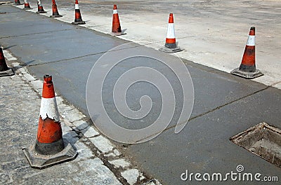 Orange cones on street repair Stock Photo