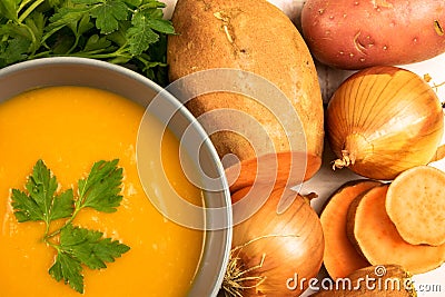 Orange creamy yams soup Stock Photo