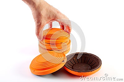 Orange cymbals for trap shooting on white background Stock Photo