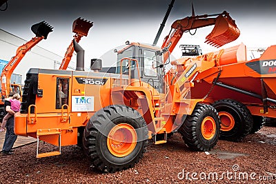 Orange diesel front end loader Editorial Stock Photo