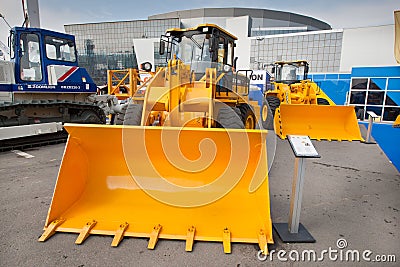 Orange diesel front end loader Editorial Stock Photo