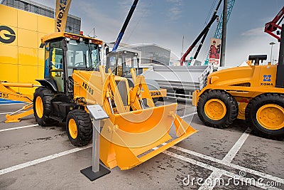 Orange diesel front end loader Editorial Stock Photo