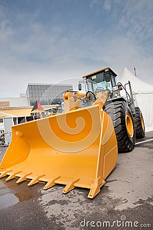 Orange diesel front end loader Editorial Stock Photo