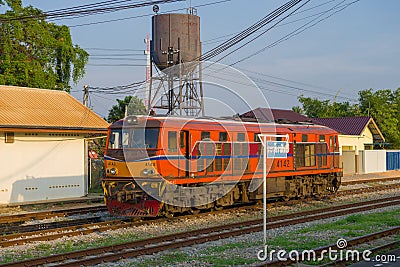 Orange diesel locomotive at the railway station Editorial Stock Photo