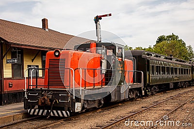 Orange diesel train locomotive Editorial Stock Photo