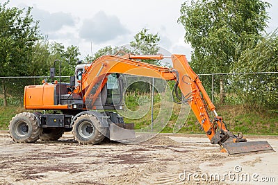Orange excavator Stock Photo