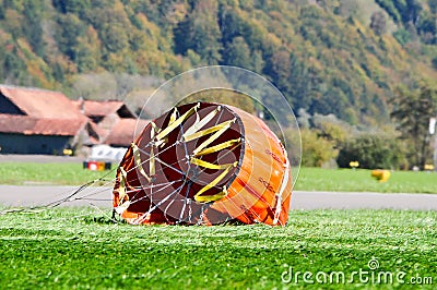 Orange fire fighting bag for helicopter super Puma on the ground Editorial Stock Photo