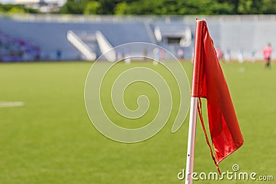 Orange flag at soccer field Stock Photo