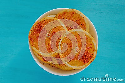 Naranja con chile, orange fruit with chili, mexican spicy food in mexico city Stock Photo