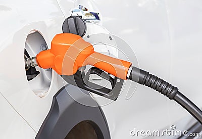 Fuel nozzle refueling gas pump for the car Stock Photo
