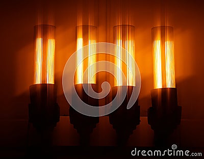 Orange glowing lamps illumination background Stock Photo