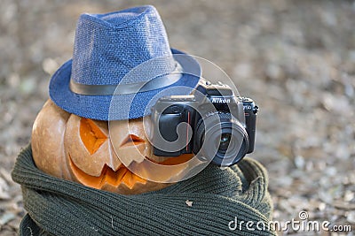 Real orange halloween pumpkin with carving Editorial Stock Photo