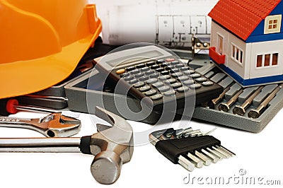 Orange helmet and different tools Stock Photo