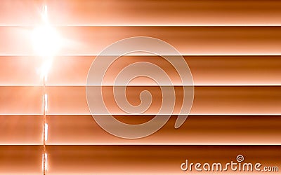 Orange horizontal blinds on the window create a rhythm through t Stock Photo