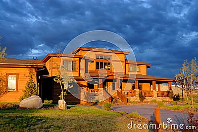 Orange house with cloudy sky Stock Photo