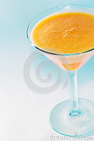 Orange jello in a martini glass Stock Photo