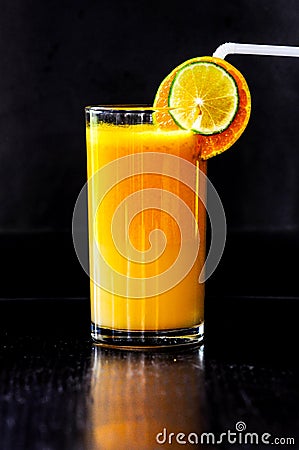 An orange juice with black background Stock Photo