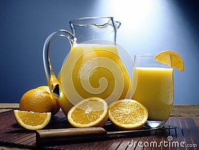 Orange juice pitcher Stock Photo