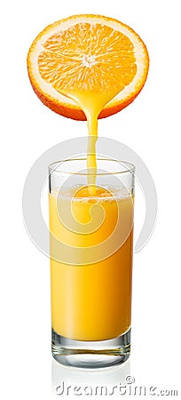 Orange juice is pouring into the glass. Isolated on white Stock Photo