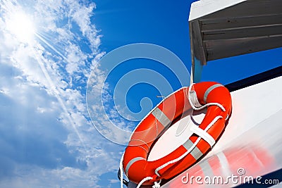 Orange Lifebuoy on a Ferry Boat Stock Photo