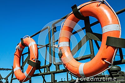 Orange lifeline on the deck of the boat Stock Photo