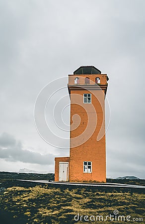 Orange Lighthouse Svortuloft Skalasnagi tower in Snaefellsnes Peninsula, west Iceland on an overcast day. Stock Photo