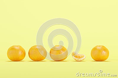 Orange lobes among oranges on pastel yellow background Stock Photo