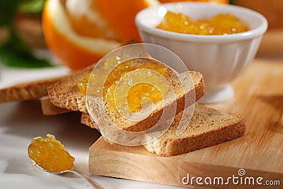Orange marmalade on toast Stock Photo