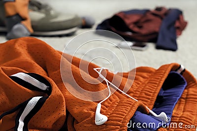 Orange mesh shorts in a messy room Stock Photo