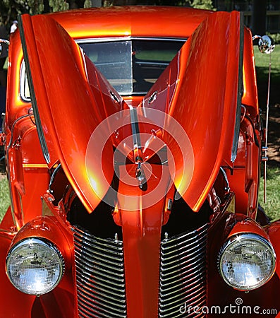 Orange Metallic Vintage Sedan Stock Photo