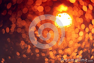 Orange night light bokeh background. City life. Blur abstract background of urban light. Warm light with beautiful pattern Stock Photo