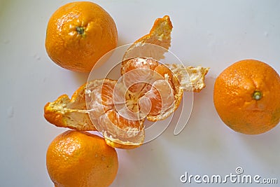 Orange oranges lie on a white table Stock Photo