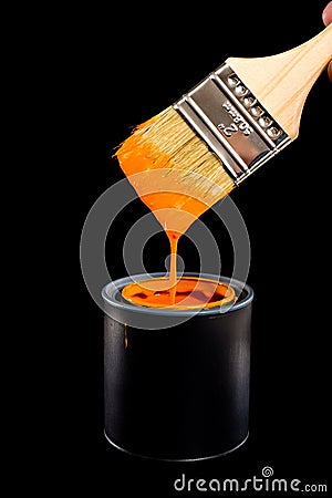 Orange Paint and Brush Stock Photo